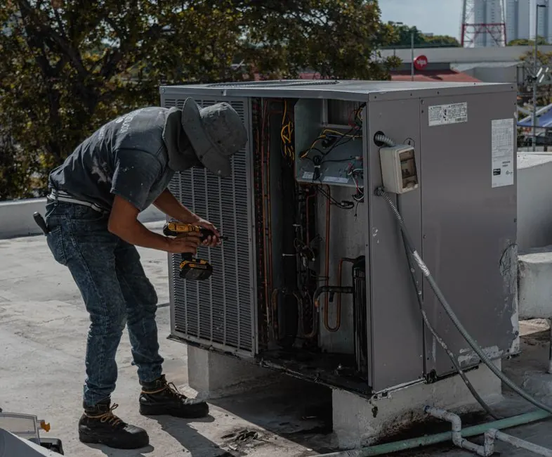 Technician using tools during a service visit